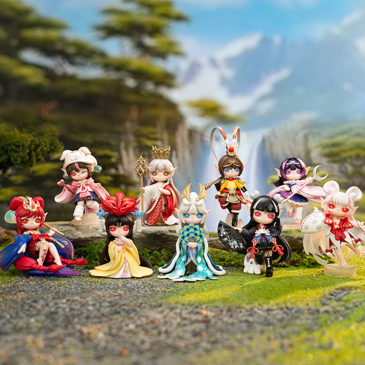 Rolife Suri figure dolls stand on grass in colorful outfits before a waterfall scene.