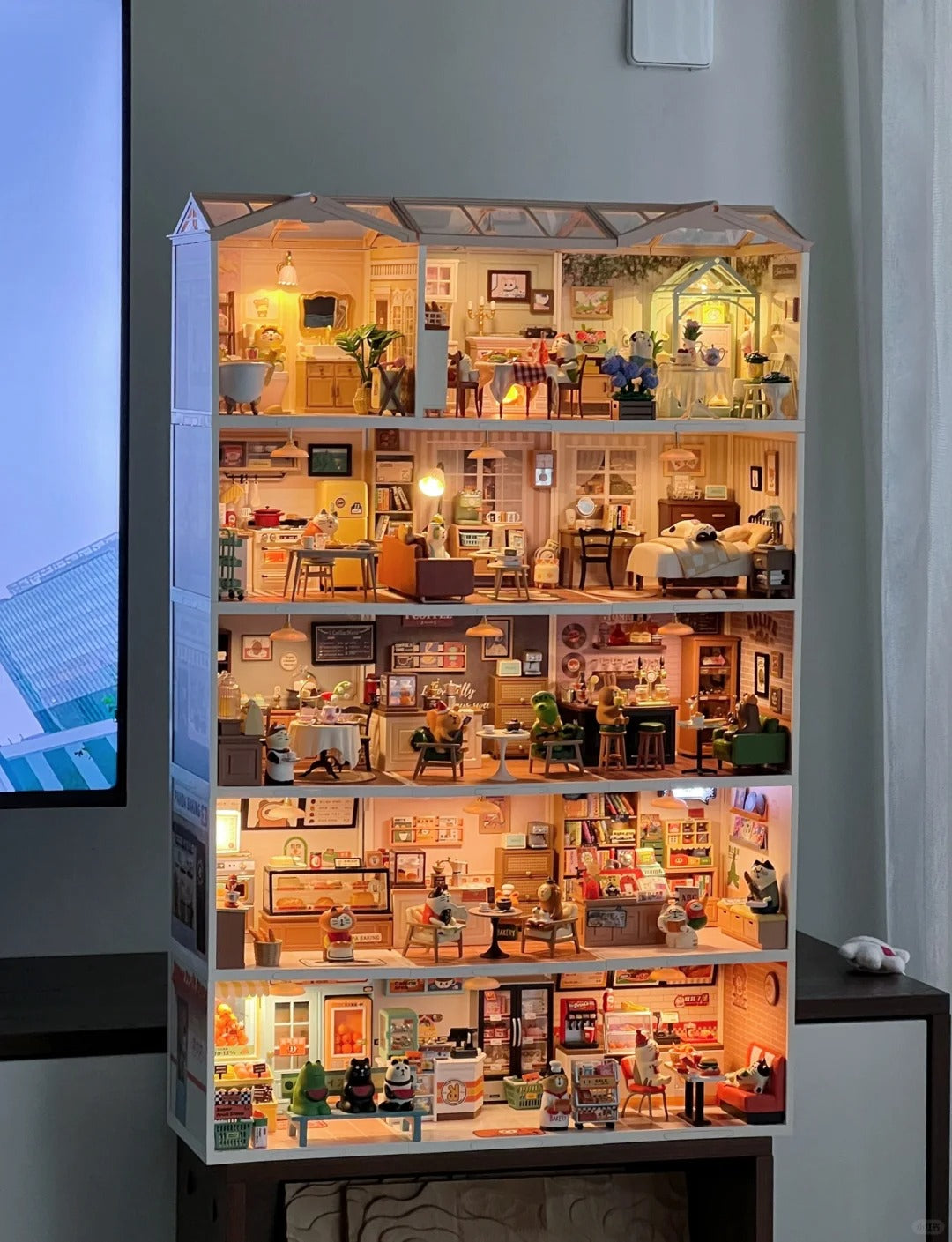 Rolife Super Creator large DIY miniature house fully assembled with nine lit rooms showing detailed home scenes