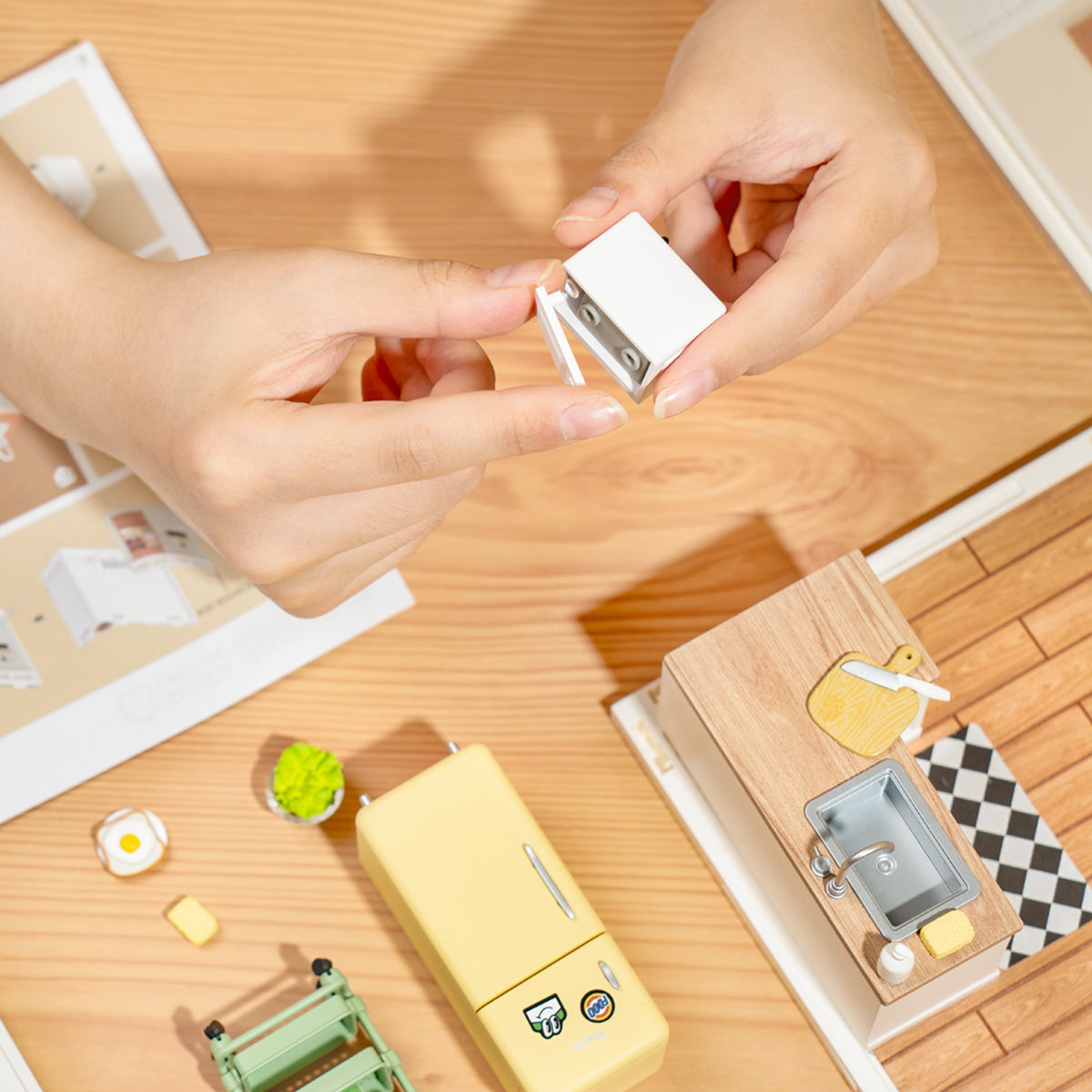 Rolife Happy Meals Kitchen DW008 miniature scene featuring a detailed kitchen interior with tiny appliances, food items