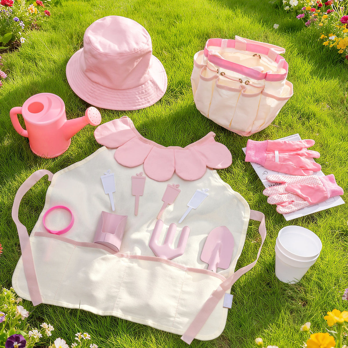 ROBUD Kids Gardening Set pink butterfly tote bag held up showing side pockets, butterfly pattern and matching tools and accessories inside