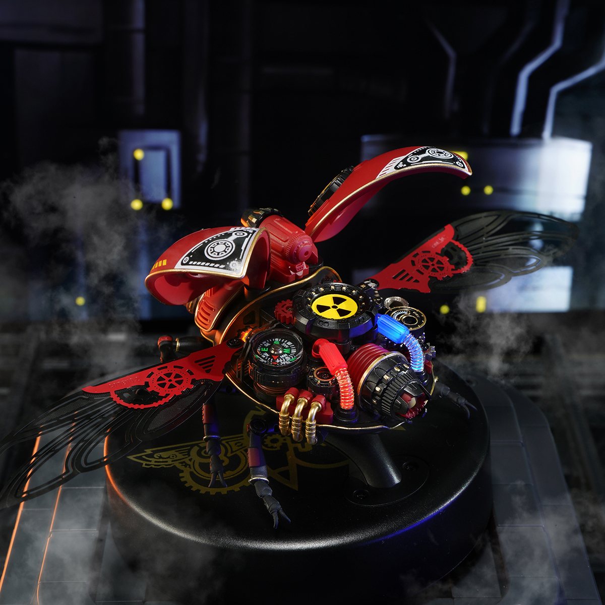ROKR Scout Beetle 3D puzzle on a round display base viewed from above, showing intricate red and black wing detail