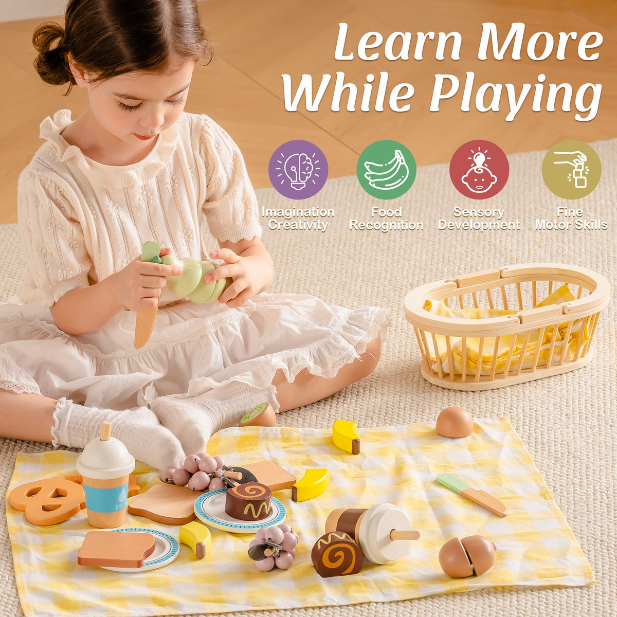 ROBUD Kids Wooden Picnic Play Food Set with young girl sitting on blanket playing with wooden pastry and food pieces from the picnic basket set