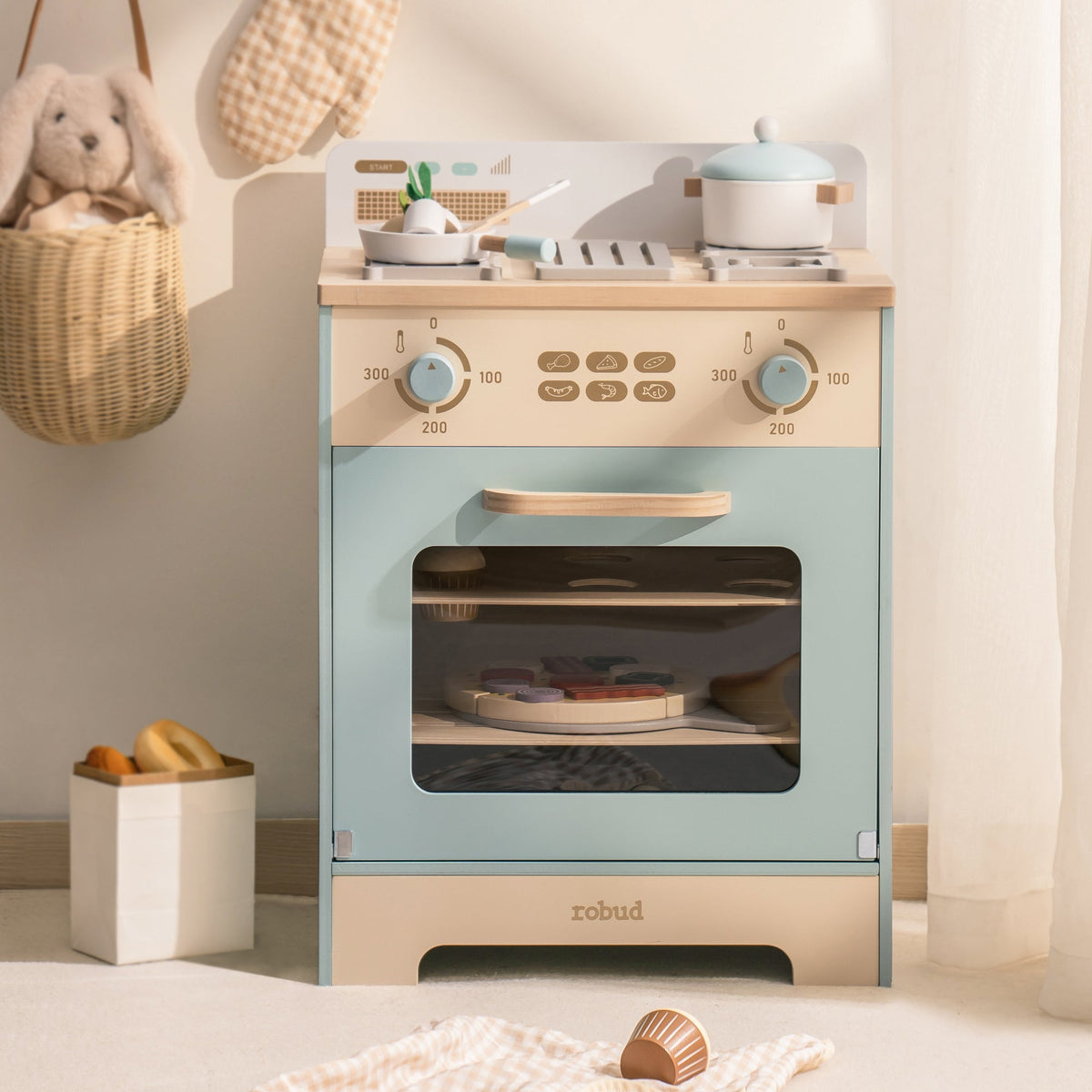 Robud green and gold standalone oven toy in mint blue with gold knobs and glass-effect door panel