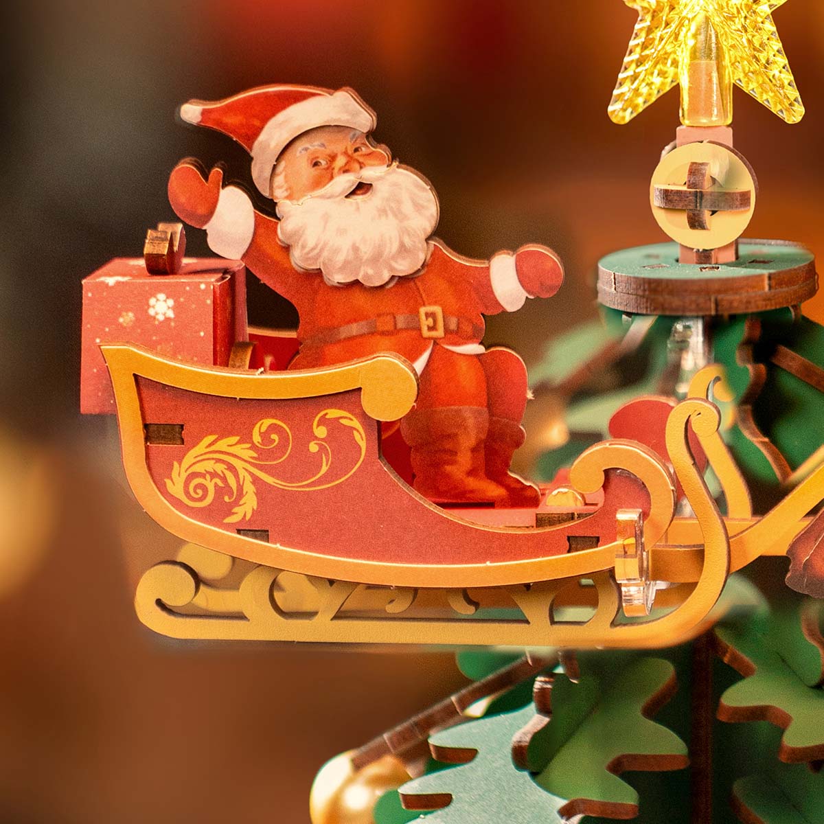 Rolife Christmas Melody Tree AMS01 close-up of rotating wooden star topper and music box mechanism