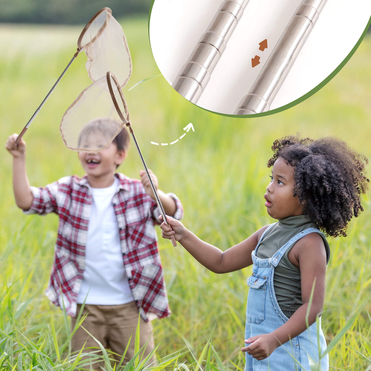 Two children playing outdoors in a sunny green field using the ROBUD dual explorer kit telescopic butterfly net together