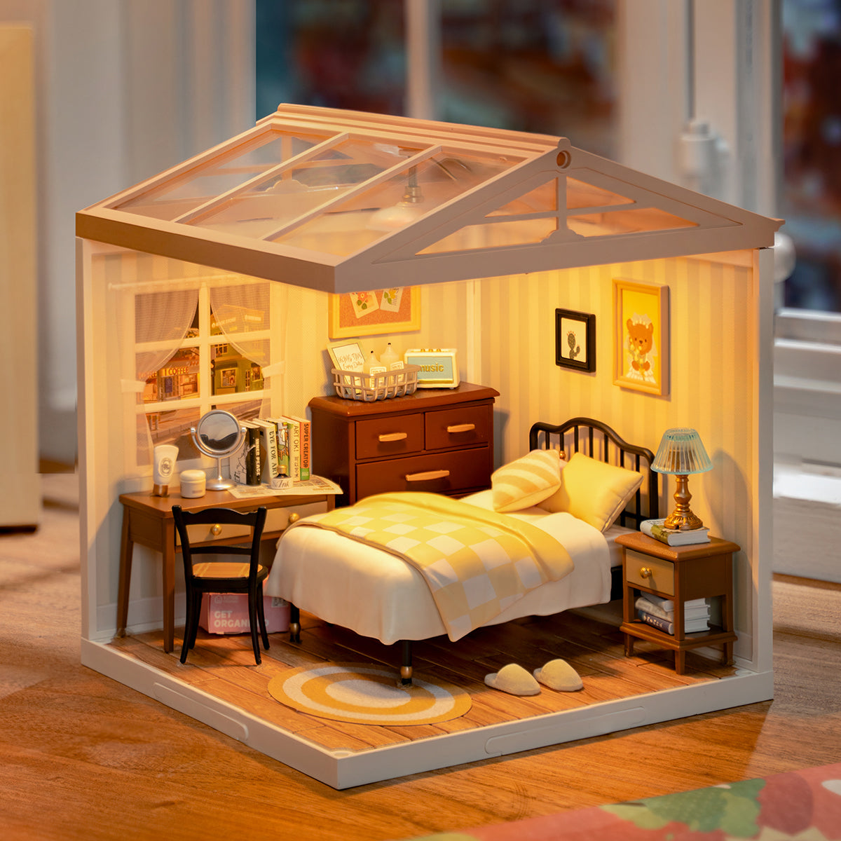 Rolife Sweet Dream Bedroom DW009 DIY book nook miniature kit, completed model displayed on a shelf