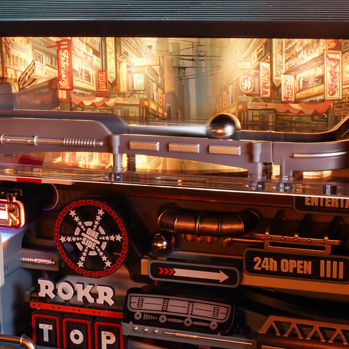 ROKR Last City marble run panel with warm windows, gauges, caution signs, and neon accents.
