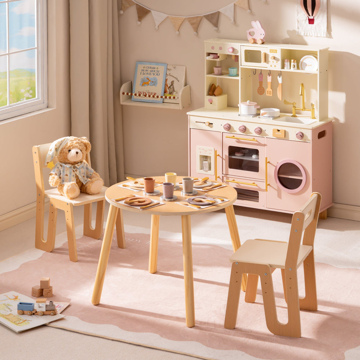 ROBUD Glowwood wooden table and chairs set with a pink play kitchen in natural light, showing the complete dining area.
