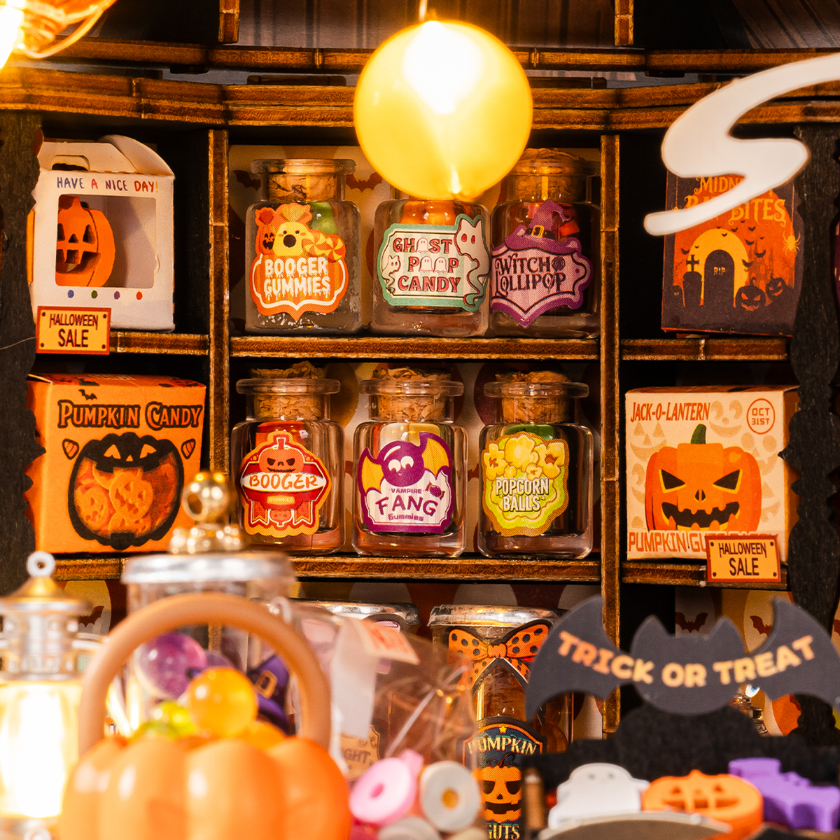 Rolife Haunted Candy House close-up of glowing candy jars and spooky shop shelves