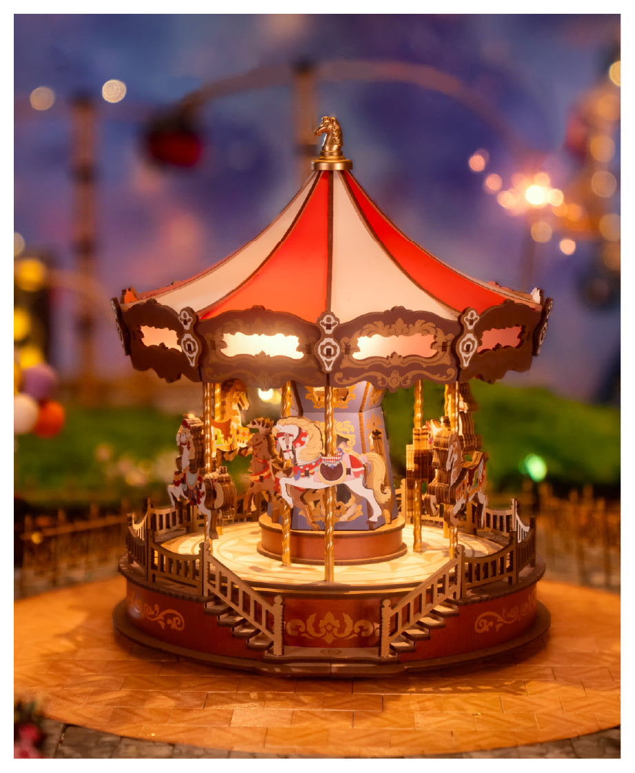 Rolife Classic Carousel Music Box with a red-topped merry-go-round and pastel horses glowing under festival lighting.