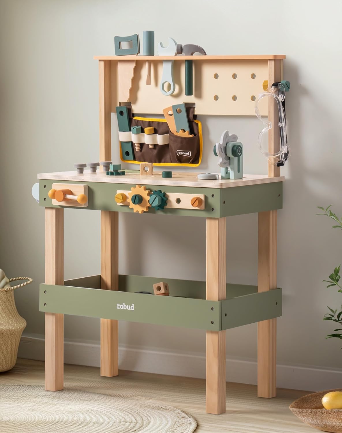 Robud avocado green wooden tool bench with pegboard top and warm natural wood lower shelf for kids