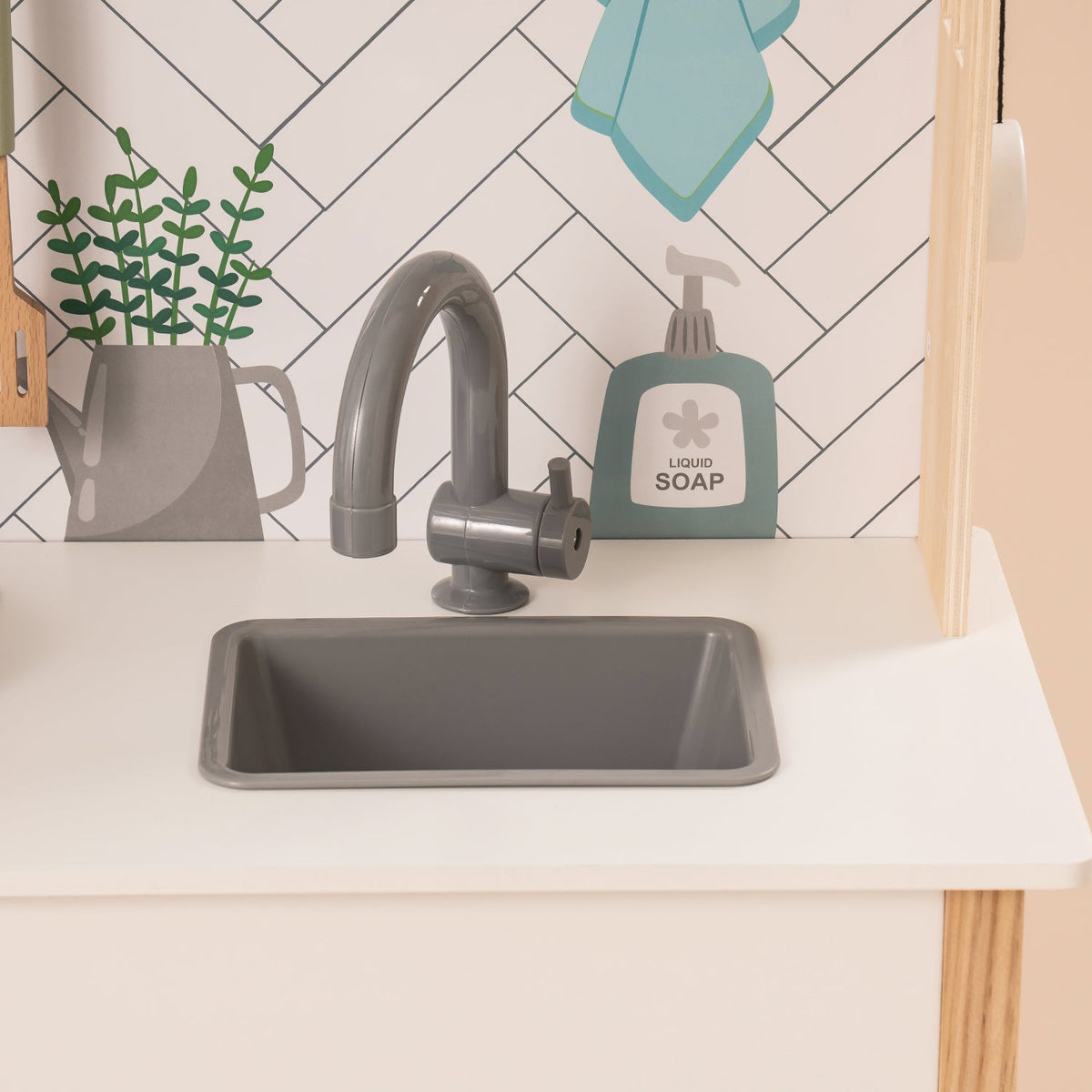 ROBUD wooden toddler play kitchen WG187 sink area showing grey basin, modern faucet, soap dispenser and herb plant