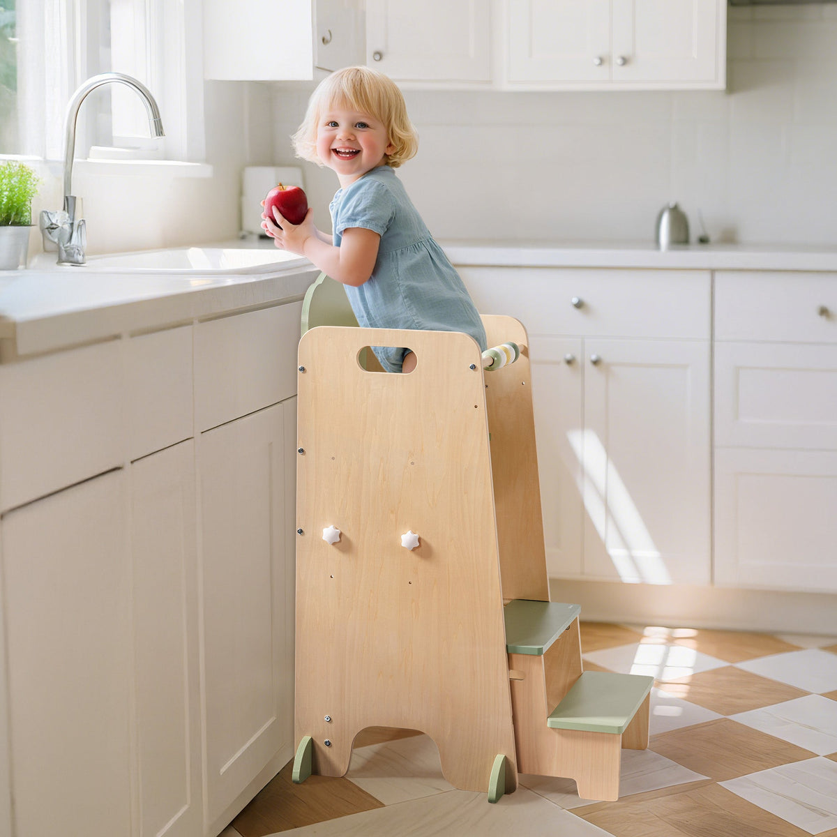 ROBUD Toddler Standing Tower two-step design with toddler reaching kitchen counter in white and natural wood kitchen environment