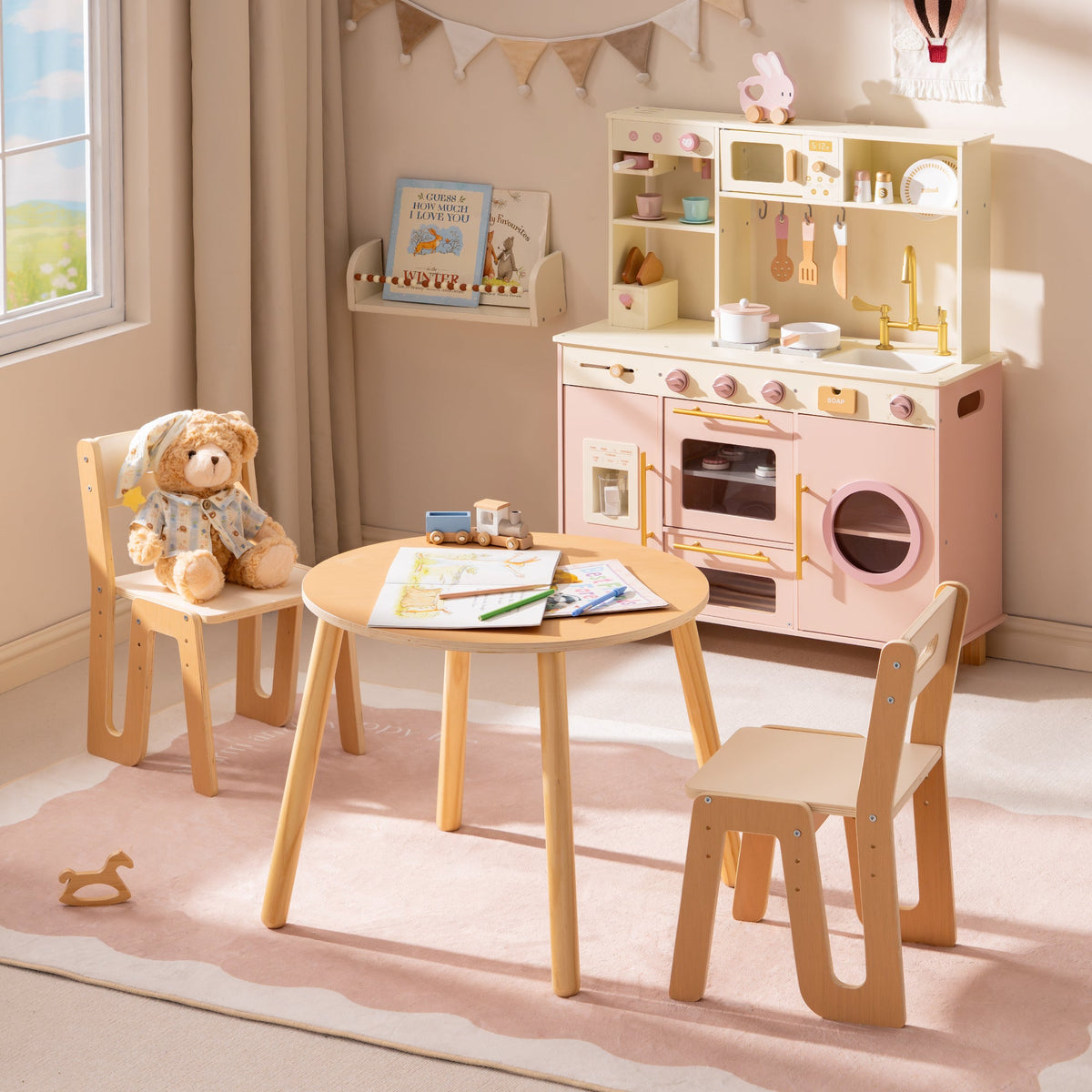 ROBUD Glowwood table and two chairs styled with a pink kitchen in the background and warm afternoon light.
