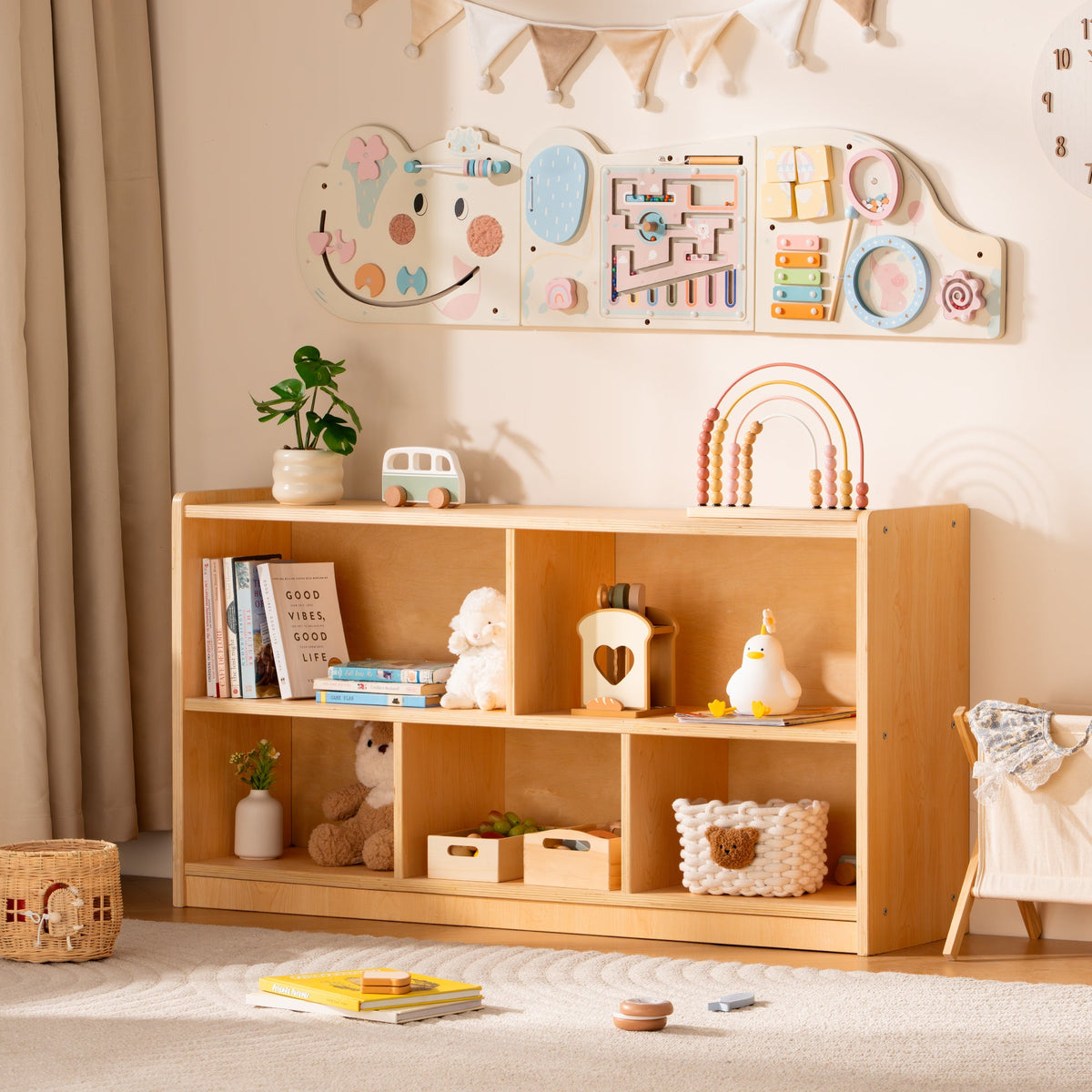 ROBUD five-shelf wooden storage unit shown against a boho wall with activity board books and pastel decor items.