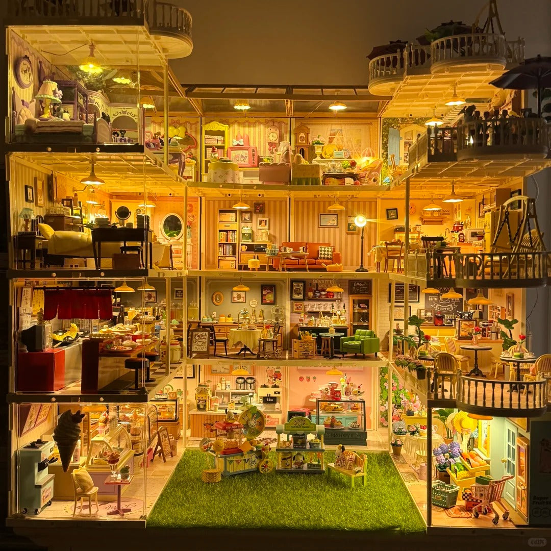 Robotime large multi-story illuminated wooden dollhouse fully assembled with warm glowing LED lights showing multiple