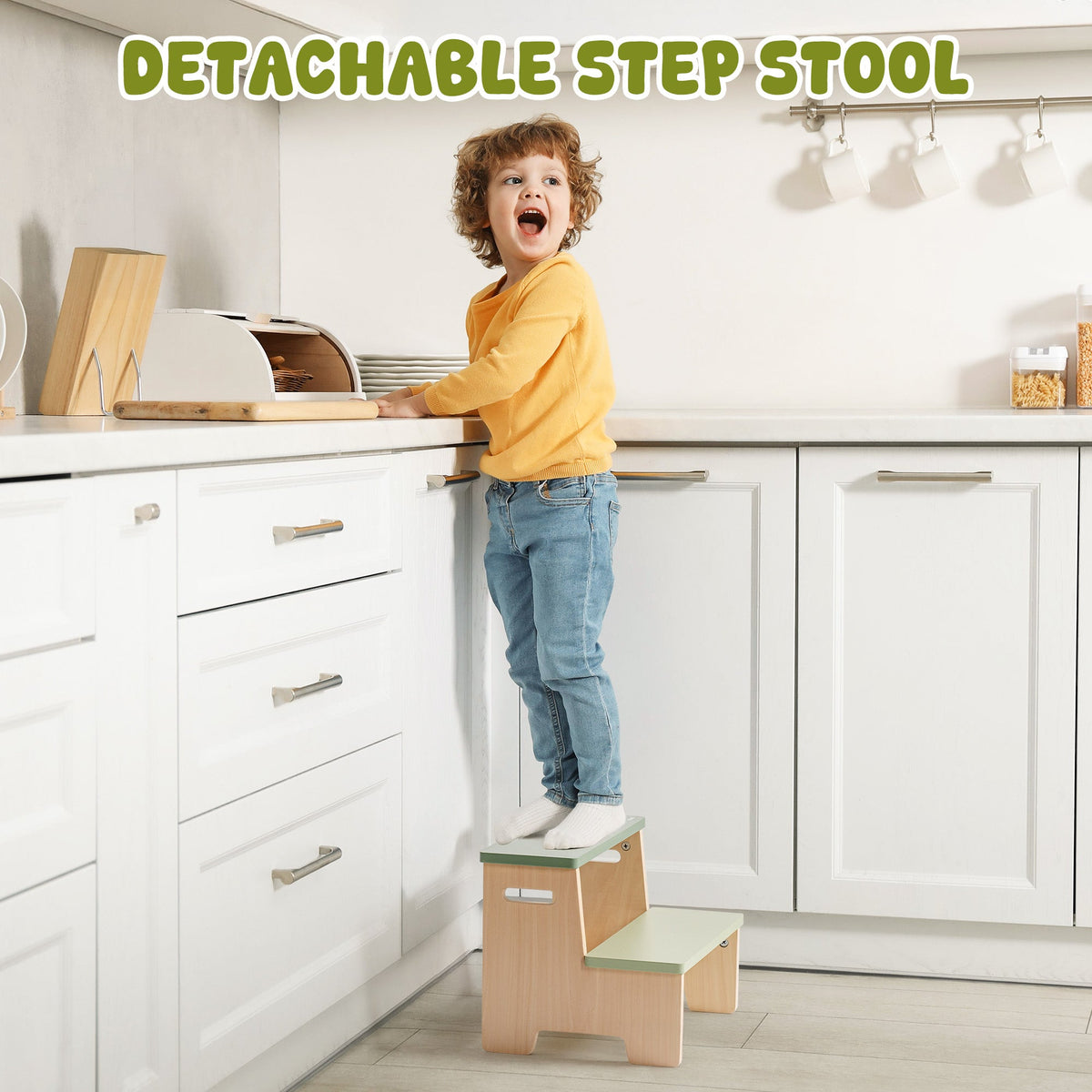 ROBUD Toddler Standing Tower with detachable step stool shown with young boy standing on it at kitchen counter