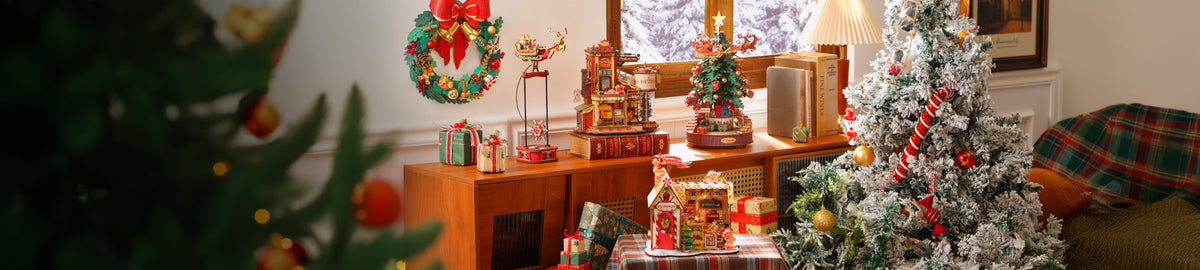 Robotime Christmas lifestyle banner showing festive room with snow-flocked tree, wrapped presents and wooden display on sideboard
