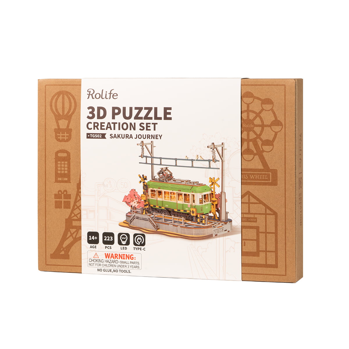 Rolife Sakura Journey 3D Puzzle Creation Set kraft brown retail box with tram scene illustration and safety warning label