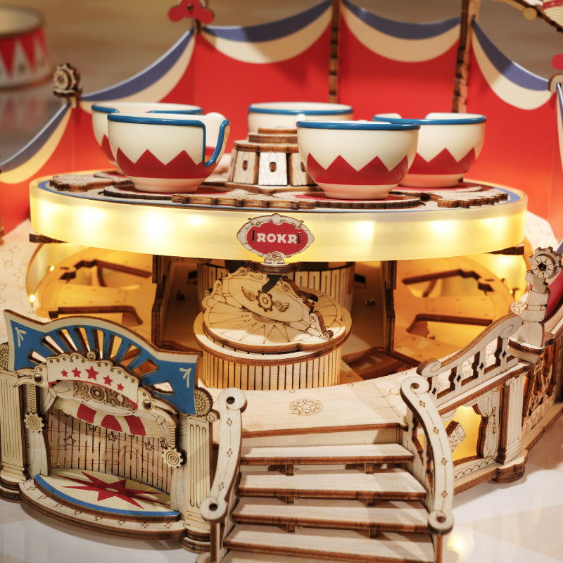 ROKR Tilt-A-Whirl Music Box EA04 mechanical music box wooden kit, front view on a neutral background