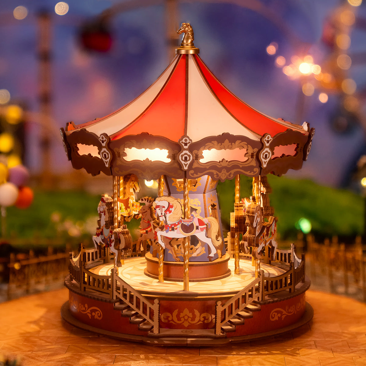 Rolife Classic Carousel AMC01 hero shot with red and white tent top, golden horses and warm LED string lights glowing