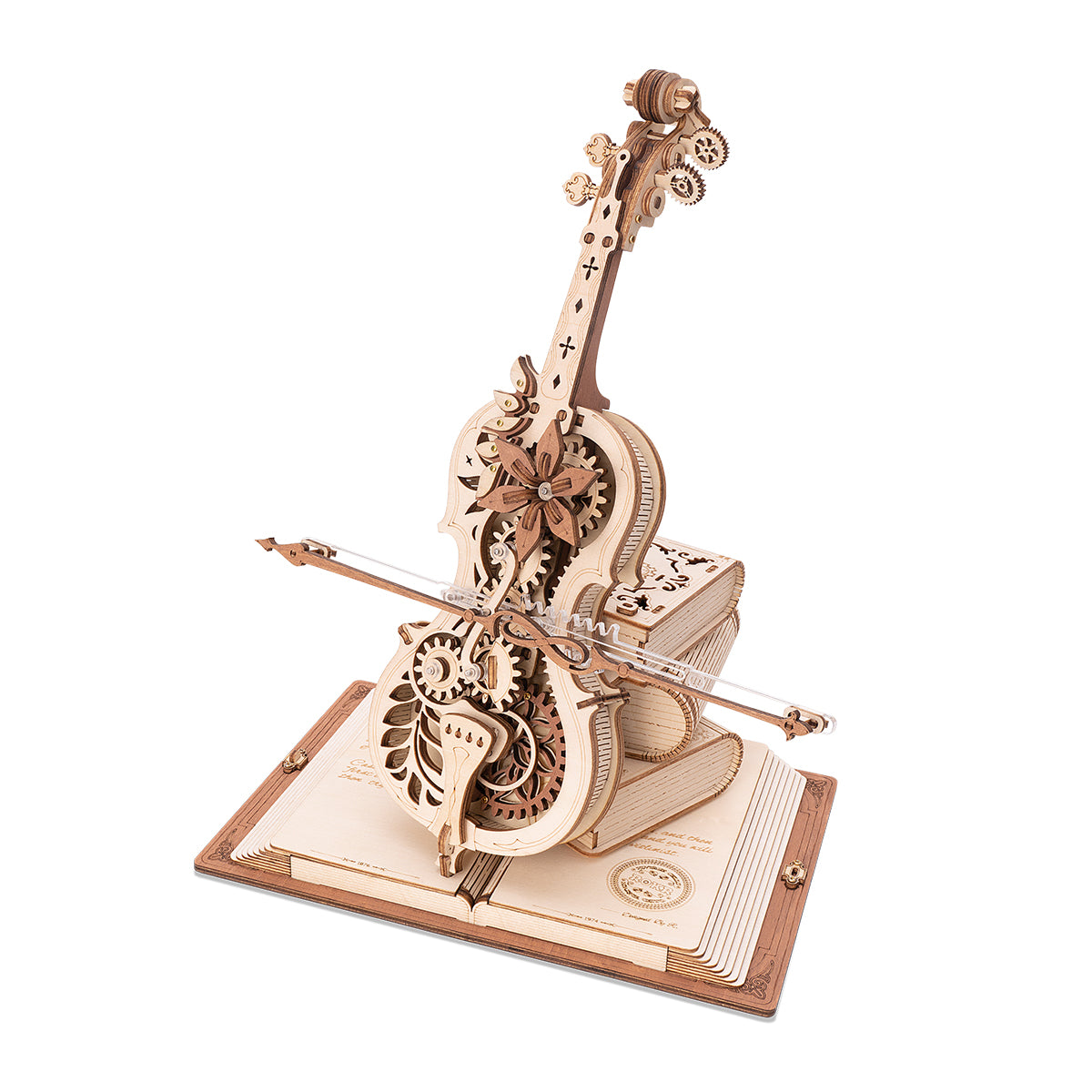ROKR mechanical music box with an ornate natural wood cello featuring floral carving resting on a book base