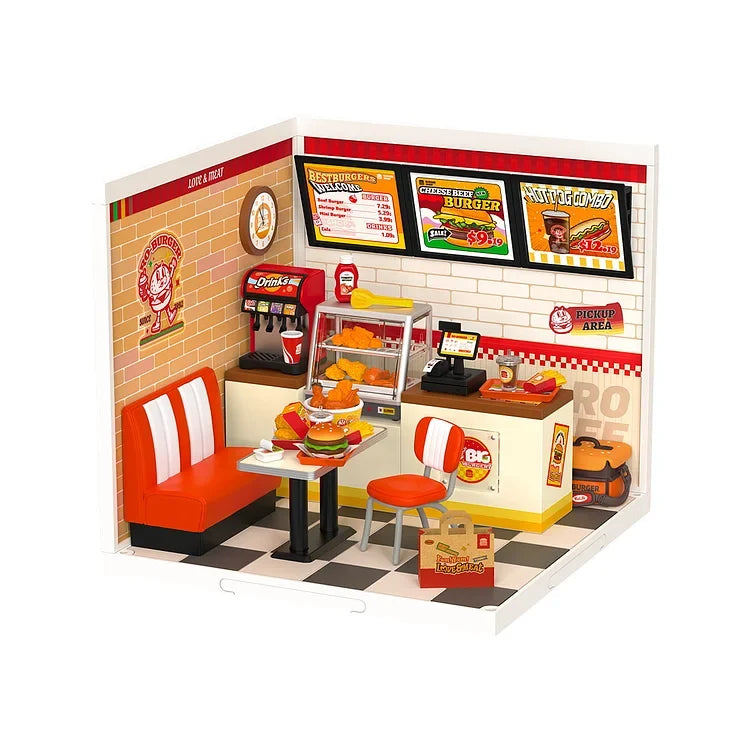 Rolife Super Creator miniature house lifestyle shot with completed model placed on desk beside books and decorative home items