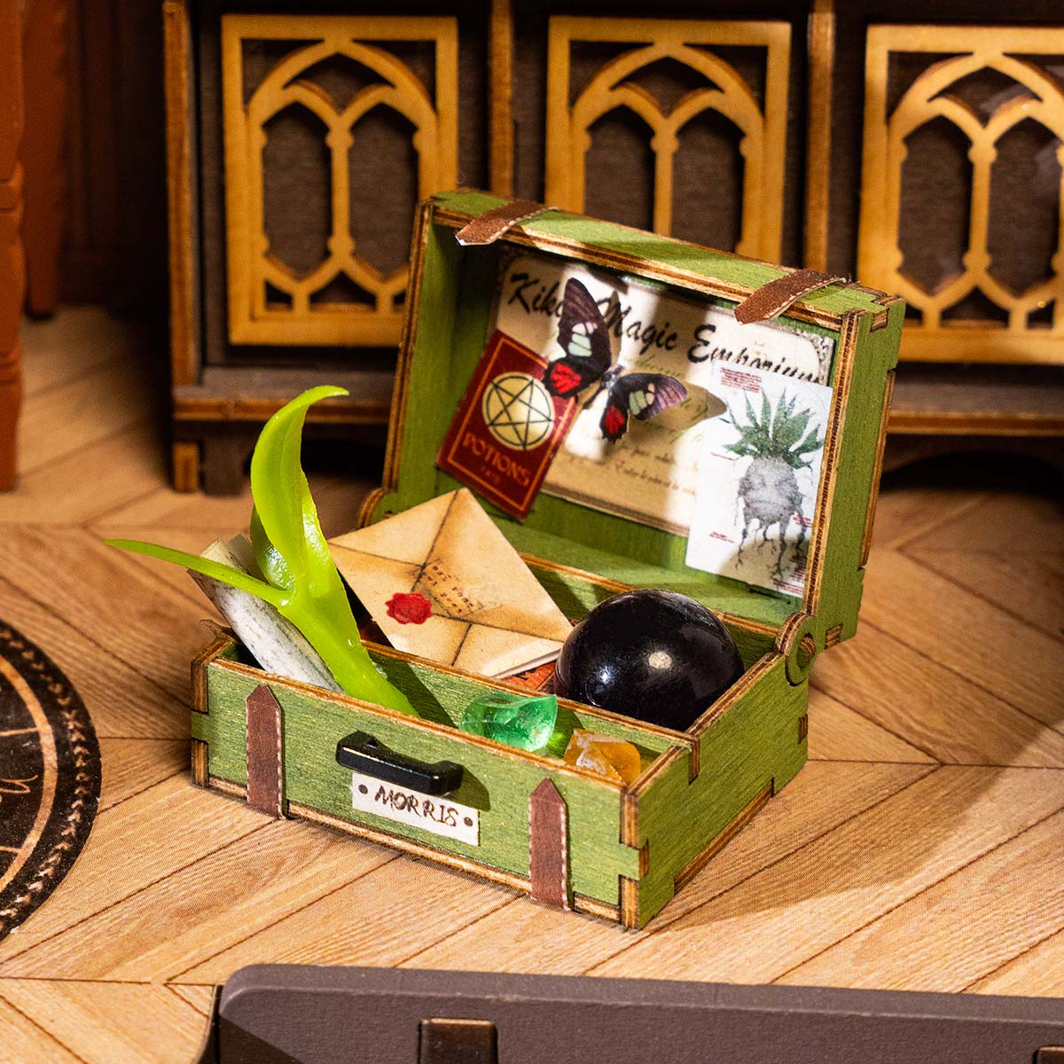 Rolife Magic Study suitcase accessory opens to show tiny plants, tools, and supplies.