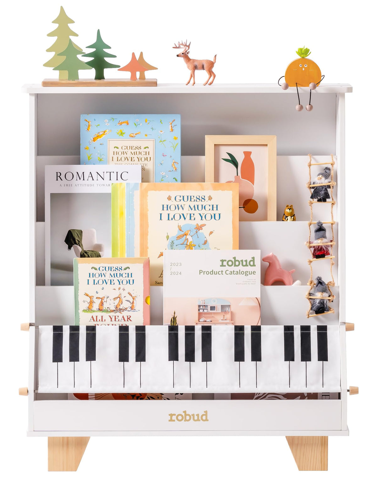 ROBUD Wooden Kids Bookshelf Piano white front view isolated product shot showing the piano-key fabric tote bag, tiered book slots filled with children's books and natural wood legs on white background