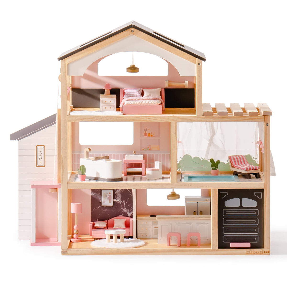 Robud three-story wooden dollhouse with pink and dark-grey roof alongside a young girl, featuring bedroom, bathroom and living room across open floors