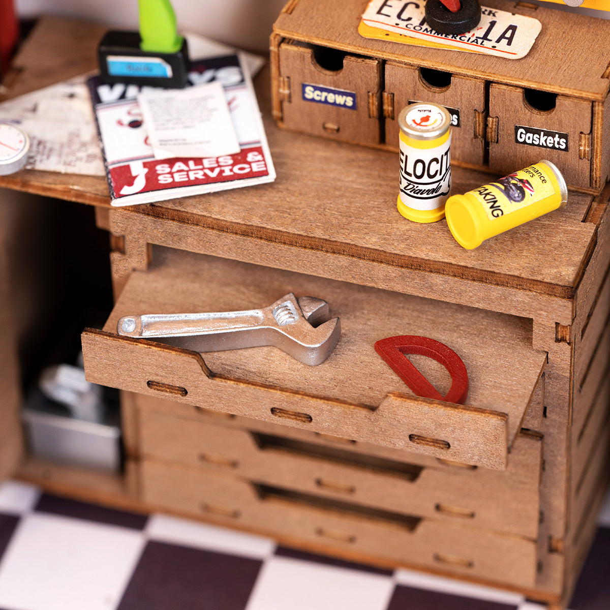 Rolife Garage Workshop miniature close up showing open toolbox drawer with wrench and small tools