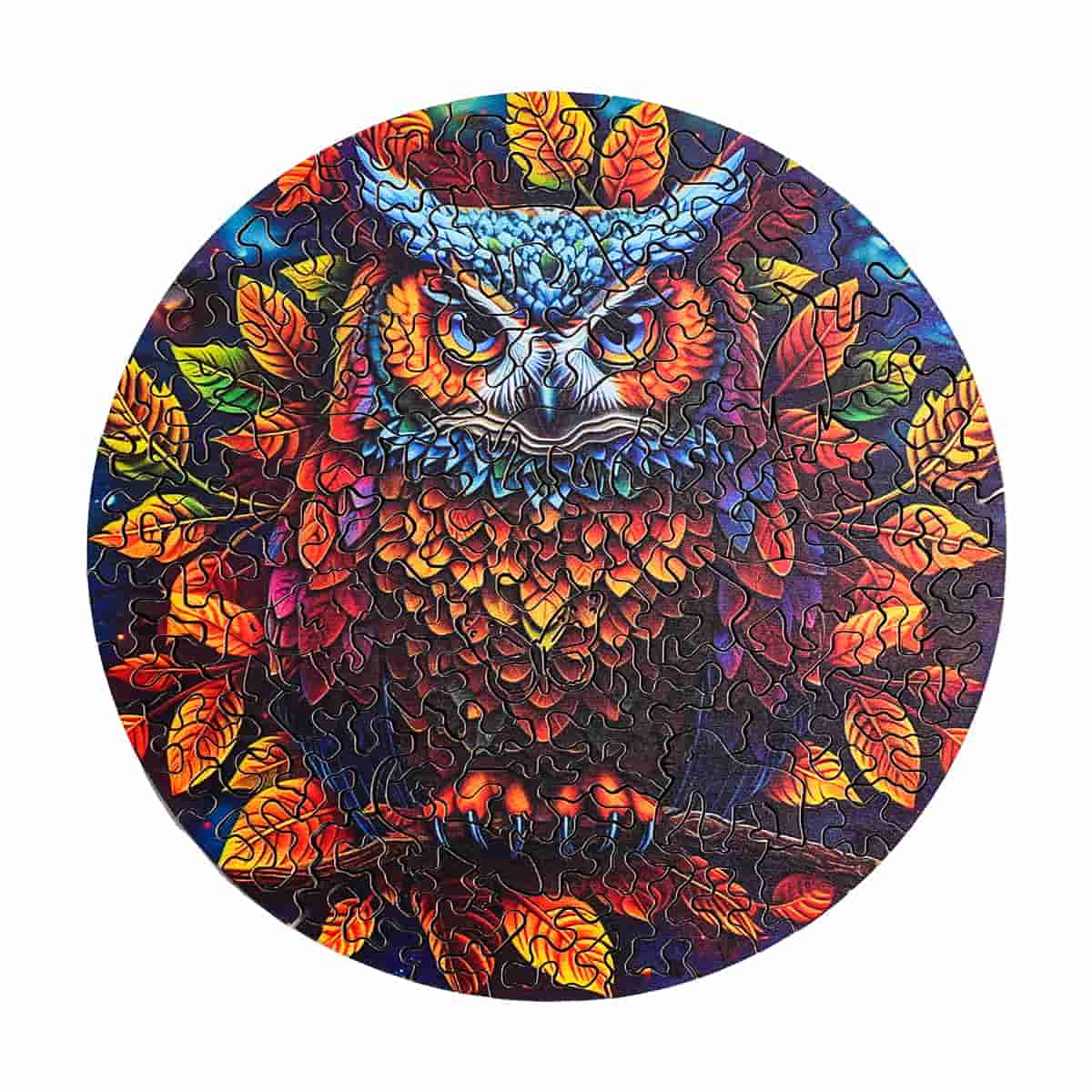 Robotime round wooden jigsaw puzzle featuring a vivid owl perched among fiery autumn leaves