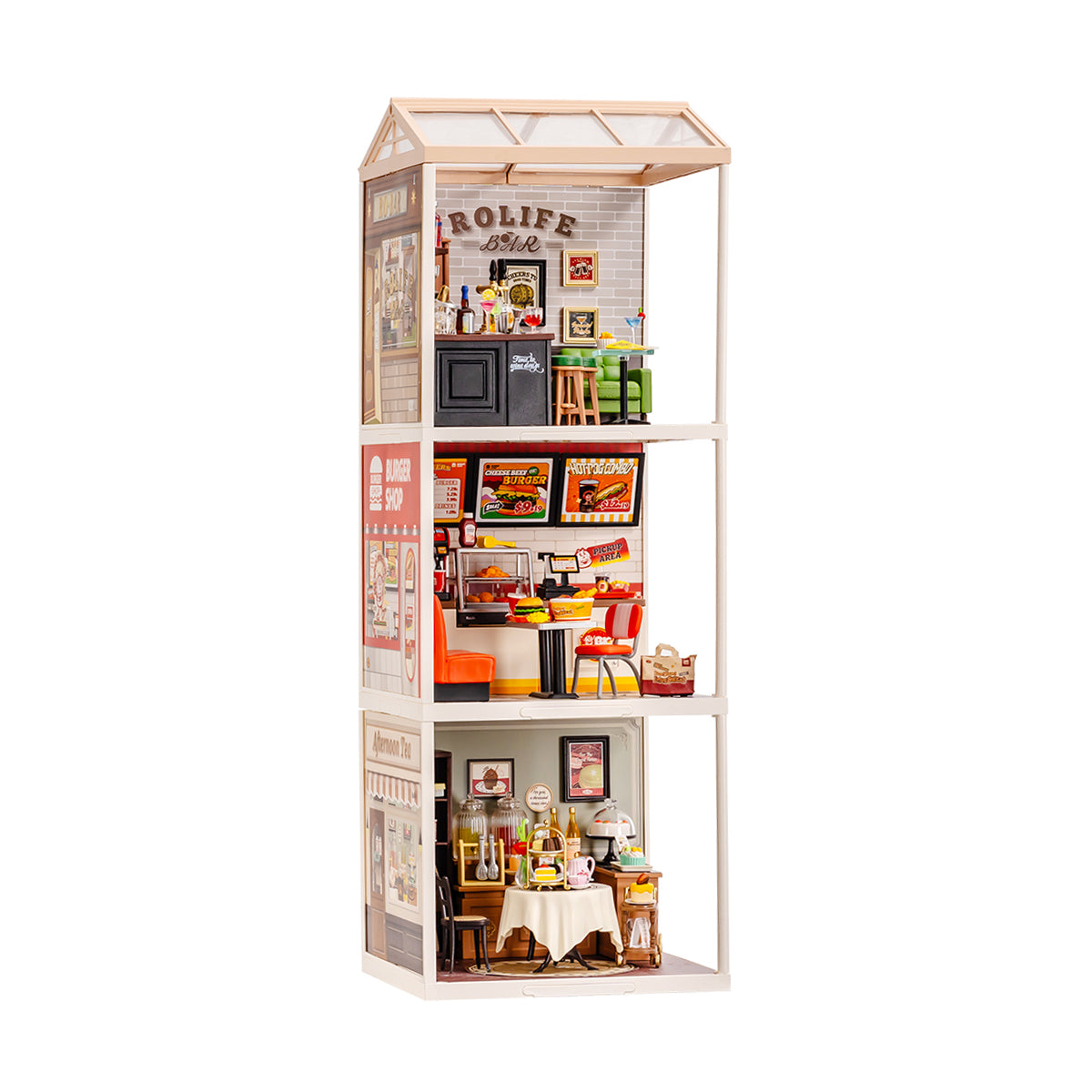Rolife Super Creator Series 3-in-1 I Shape miniature with Rolife Bar, burger diner, and afternoon tea restaurant modules stacked in a white frame on a wooden desk.