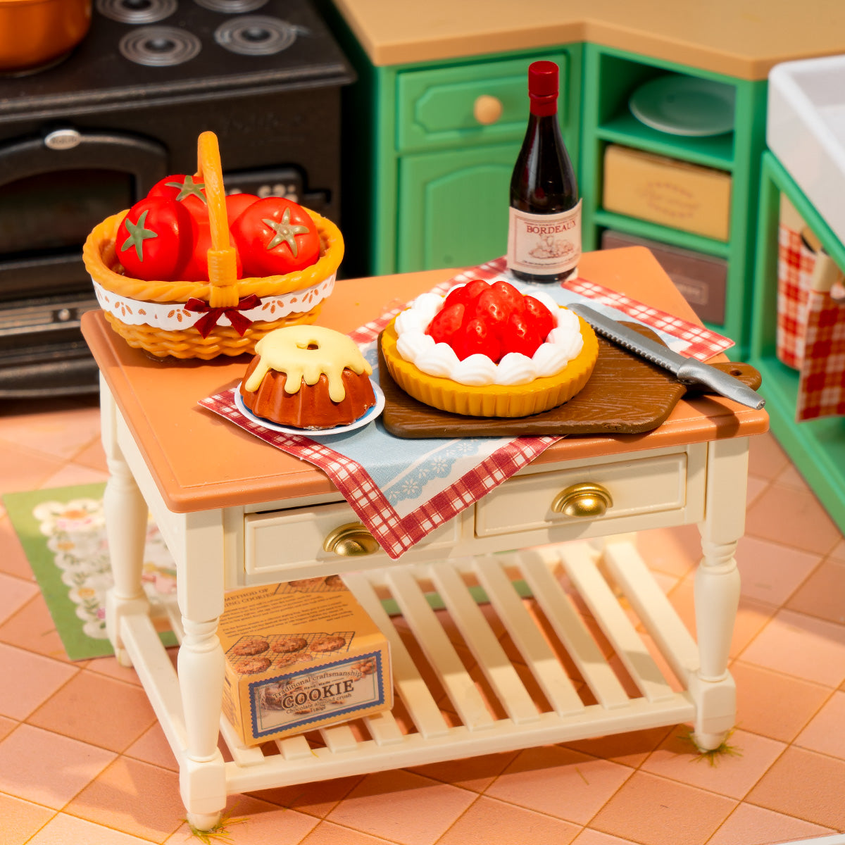 Rolife Farmhouse Kitchen DW024 kitchen island detail with red tomatoes in a basket, strawberry tart, and a wine bottle on a checkered cloth