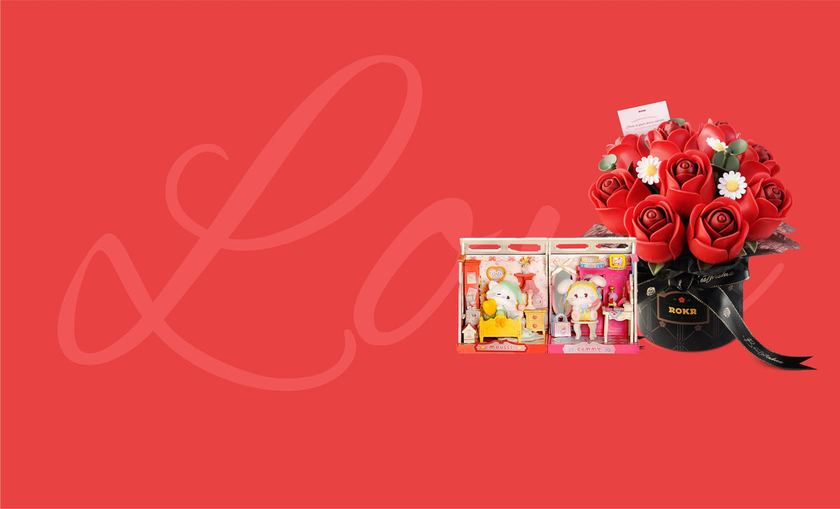 Robotime Valentine's Day banner on red showing a black hat box of wooden roses and gift sets with cursive Love script.