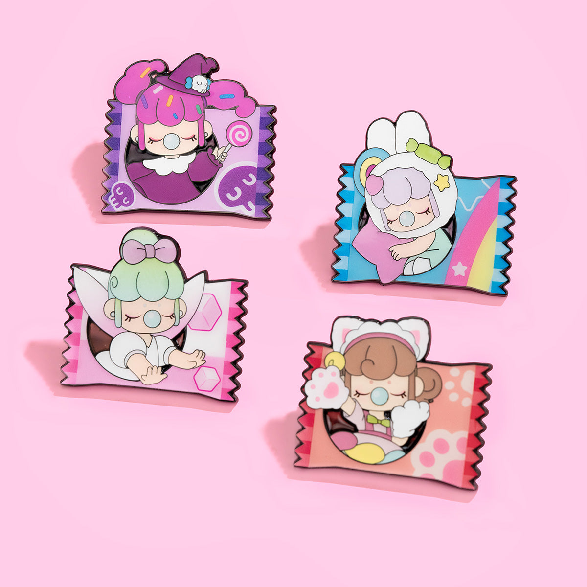 Four Rolife Nanci Sweet Time candy-wrapper enamel pins on a pink background featuring the Witch in purple, Fluffy Cloud in blue, Tea Cup in pink, and Kitty in red