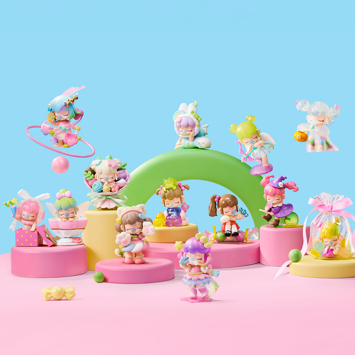Complete Rolife Nanci Sweet Time collection of twelve figures plus hidden variant displayed on tiered pink and yellow podiums with rainbow arch centrepiece