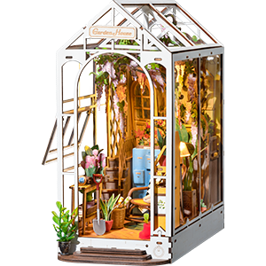 A Rolife Garden House book nook TGB06 product shot showing a tall illuminated miniature garden alley with flowers, vines, a bench, and a white cat