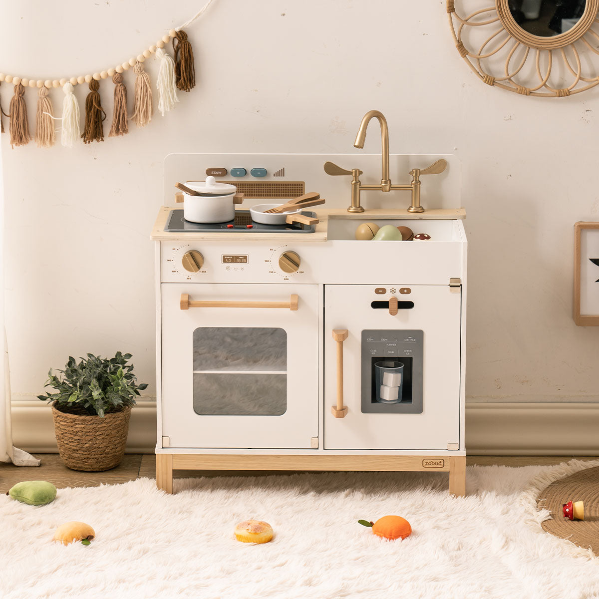 ROBUD Montessori white and wood play kitchen with sink, stovetop, oven and ice machine on leg base.