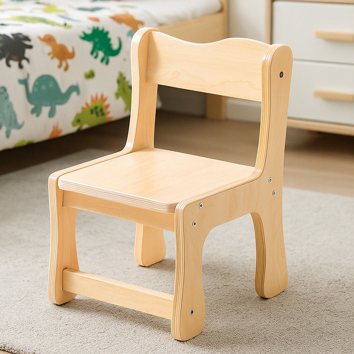 ROBUD natural birch wood kids chair with curved backrest and sturdy legs displayed on a bedroom rug.