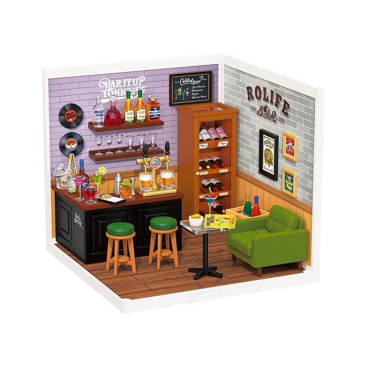 Rolife Super Creator miniature kit components laid flat showing pre-cut wooden frames, tiny furniture parts, and decorative elements