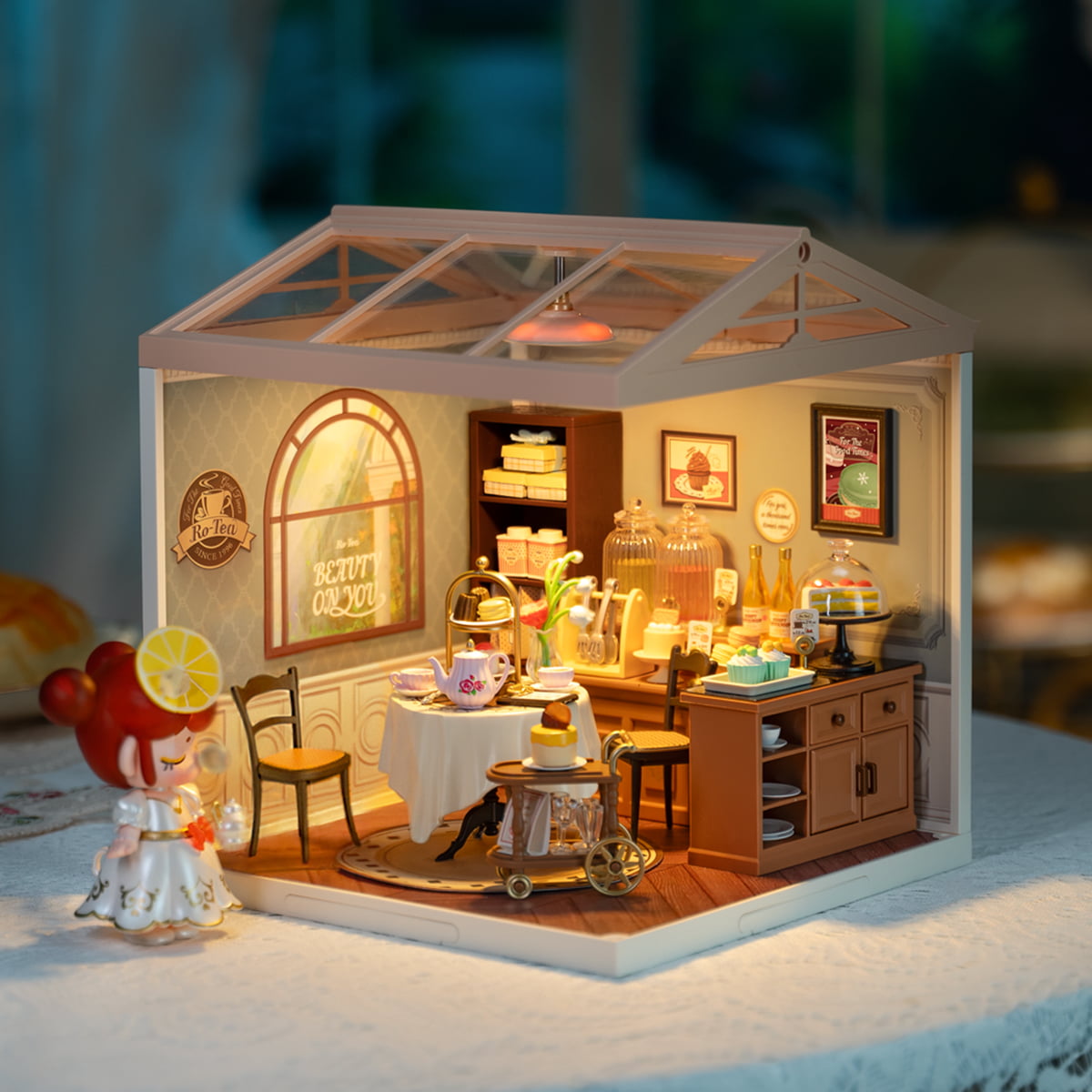 Rolife Sweet Sips Tea DW011 DIY book nook miniature kit, lifestyle scene on a wooden desk