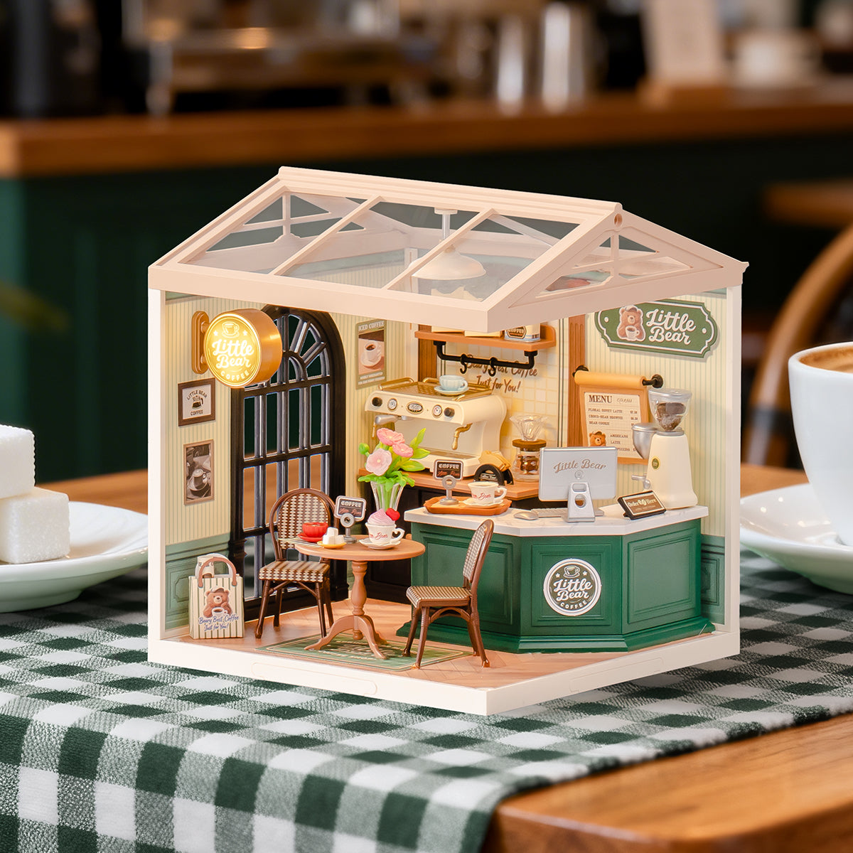 Rolife Perfect Romance Café Miniature House DW028 DIY miniature house kit, product front view on neutral background